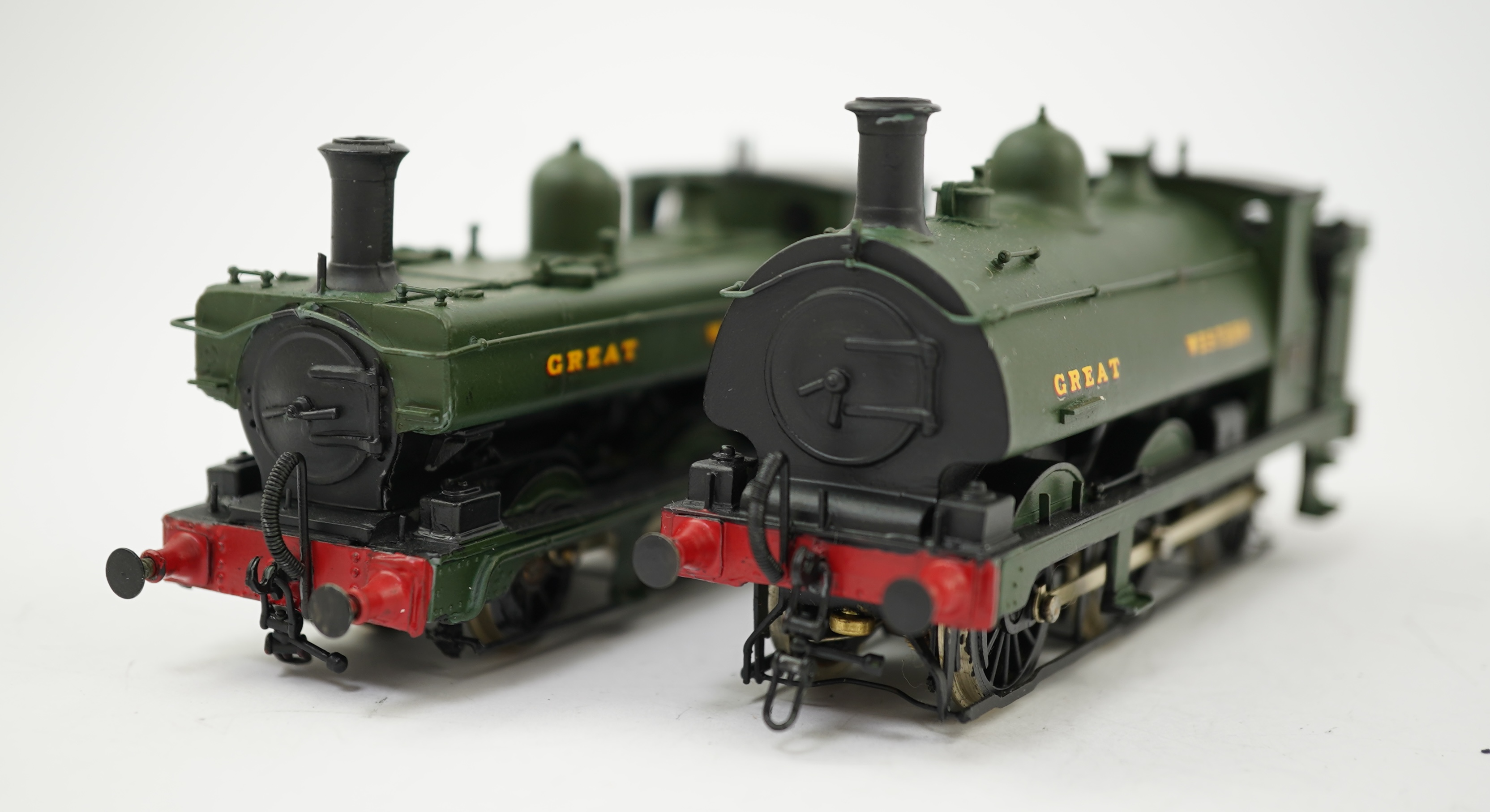 Two 00 gauge brass and white metal kit built GWR tank locomotives; a 2021 class 0-6-0PT, 2032, together with an 1854 class 0-6-0ST, 1858, constructed, painted and lined to a high standard, both motored for two rail opera